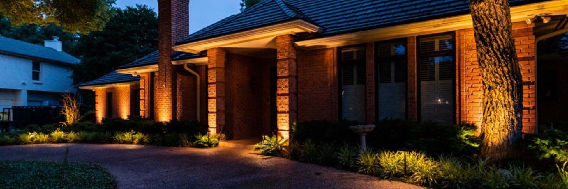 landscape-lighting Landscape lighting installed in a garden, featuring Lawn & Landcare, highlighting their professional landscape lighting services.